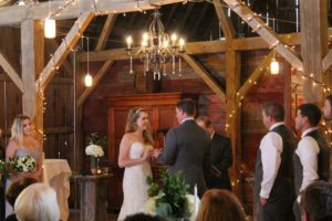 indoor barn wedding ceremony, Justin Trails Resort, Sparta, WI